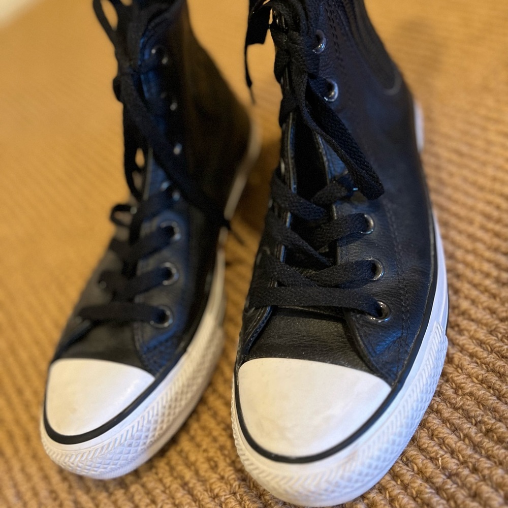 Black leather high tops